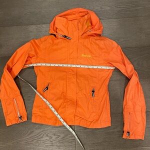 Orange zip up bench wind jacket